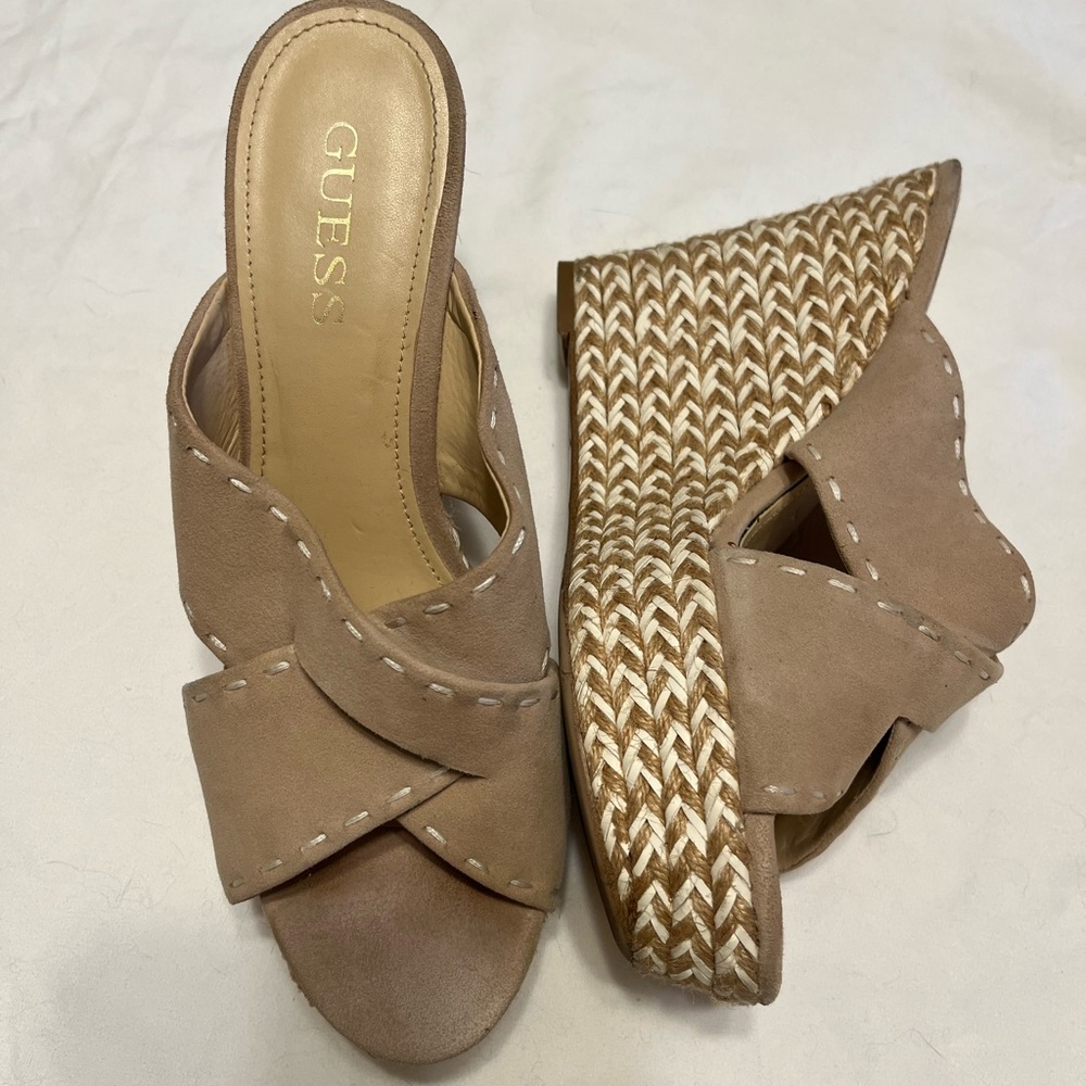 GUESS platform sandals.